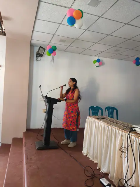 Speaker addressing students at the World Sea Turtle Day programme