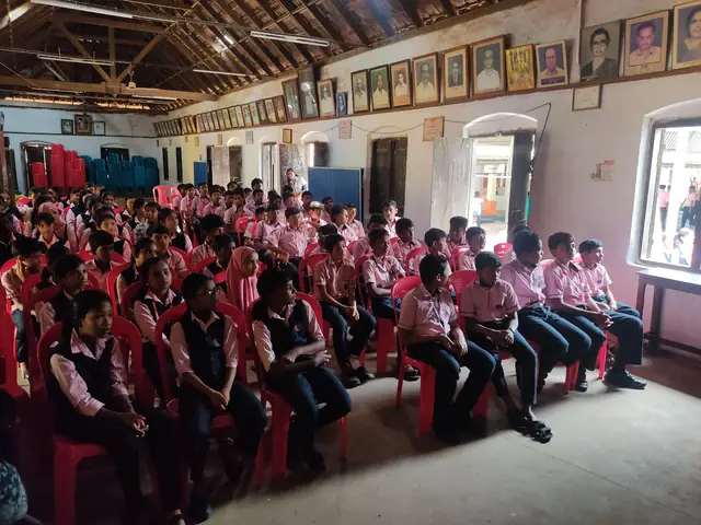 Students seated in the school hall